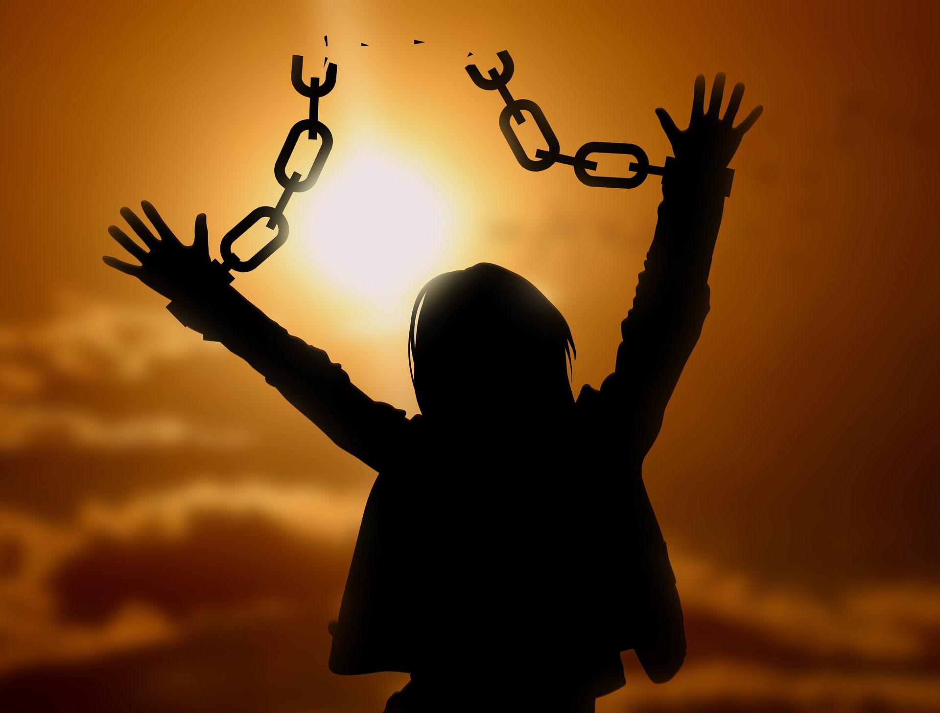woman breaking free from chains